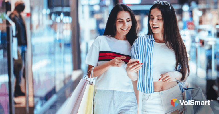 Ragazze nel centro commerciale si connettono al WiFi Guest inPiazza di Voismart
